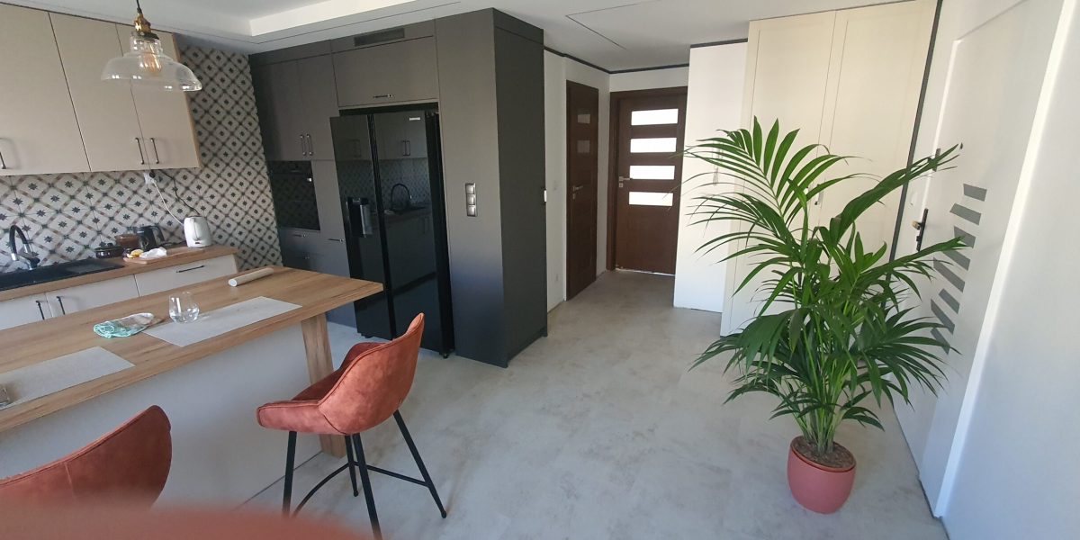 Efekt końcowy remontu – nowoczesna kuchnia po adaptacji trzech pomieszczeń, Stalowa Wola